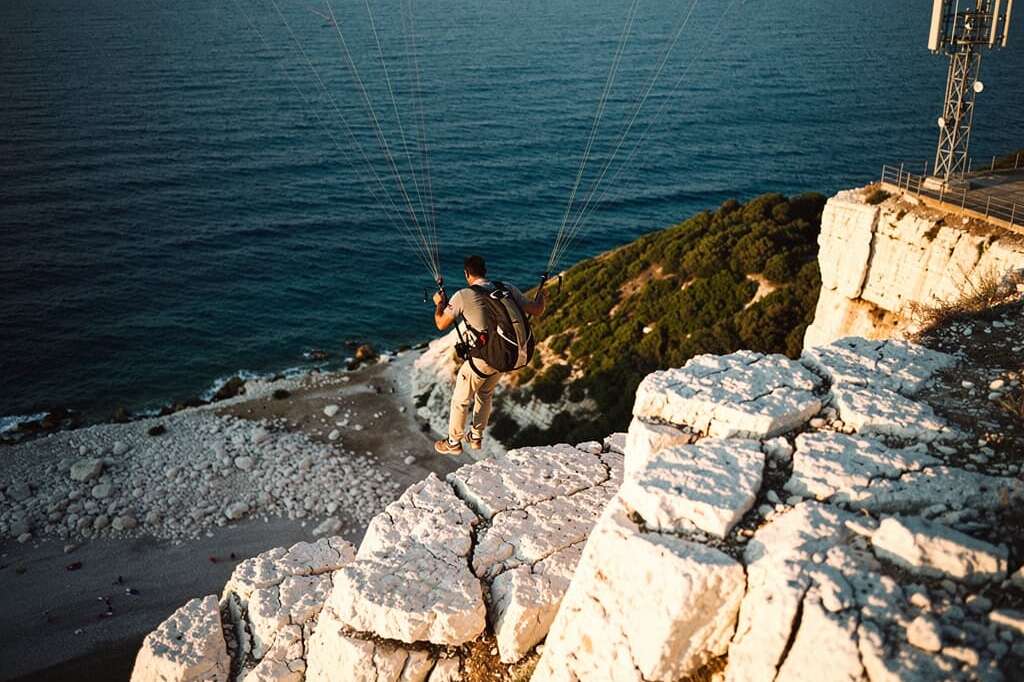 Turkey's 'white cliffs' become paragliding hotspot despite swimming ban and safety concerns